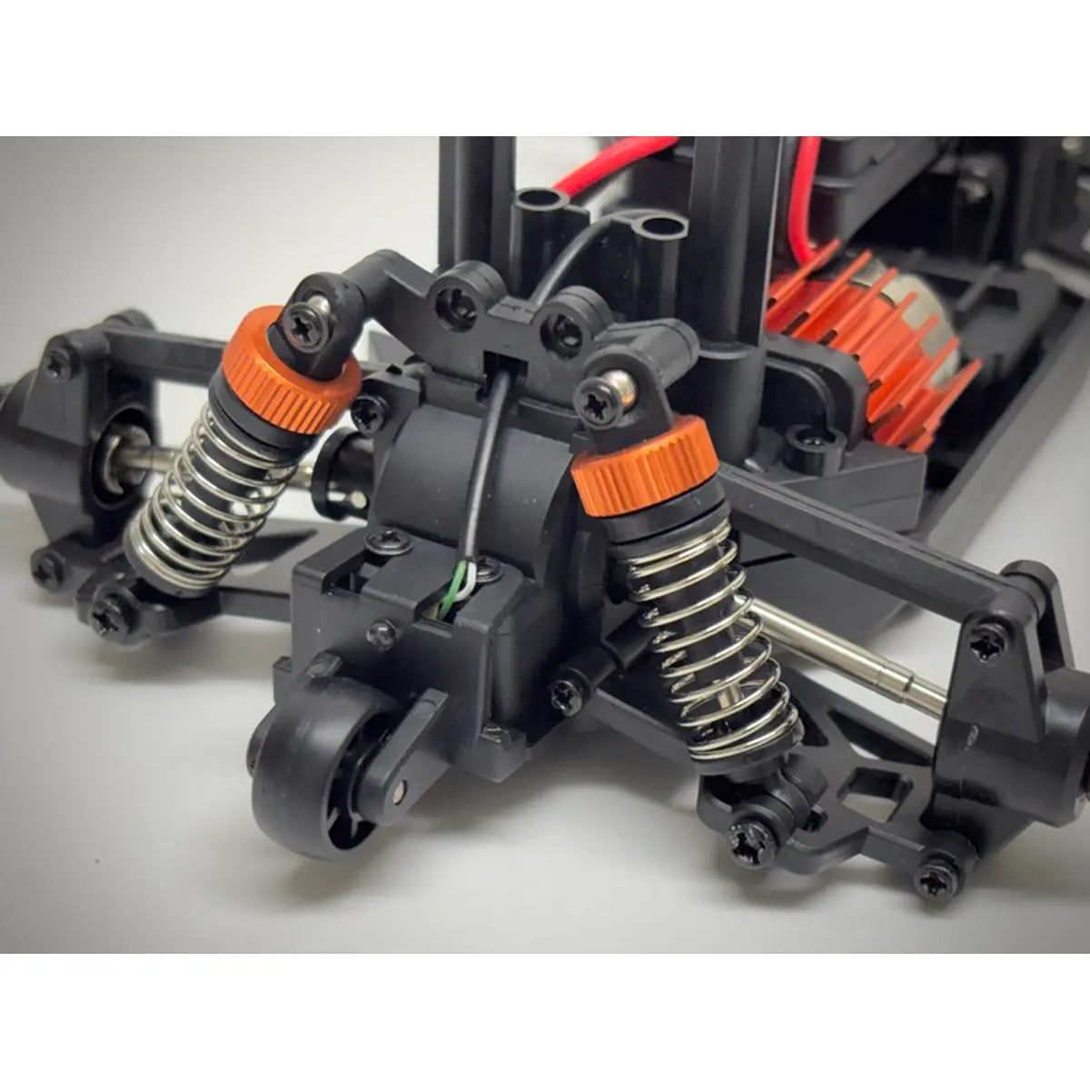 Absima Reckless Rock Racer 1:20 LED 4WD brushed RTR Grün 10030 – Radaufhängung hinten