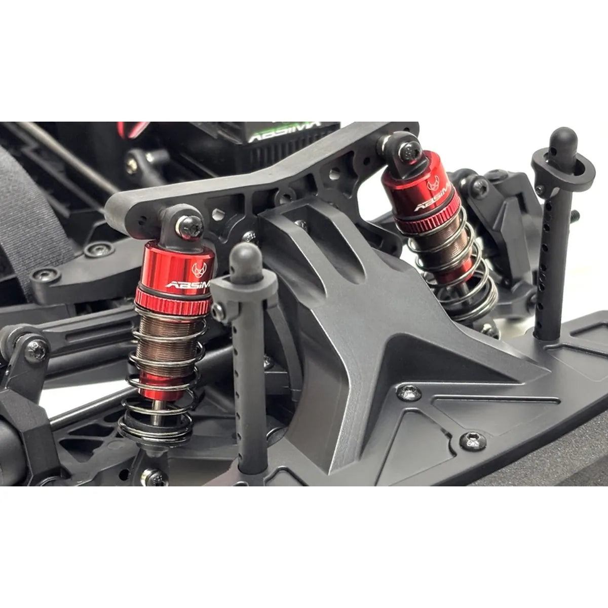 Absima STi-X Rally brushless 4WD 12234 im Maßstab 1:10 Rally RTR – Detailansicht Fahrwerk mit Stoßdämpfern und Radaufhängung