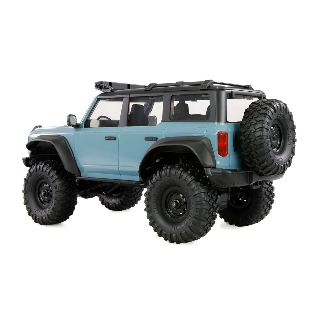 Amewi AMXRock Mini-Caballo Scale Crawler 4WD Blau 22719 im Maßstab 1:16 Crawler RTR – Seitenansicht