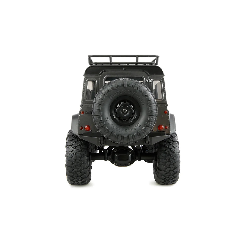 Amewi AMXRock Mini-D90 Scale Crawler 4WD Grau 22726 im Maßstab 1:16 Crawler RTR – Rückansicht mit Reserverad, Reling, Reifen