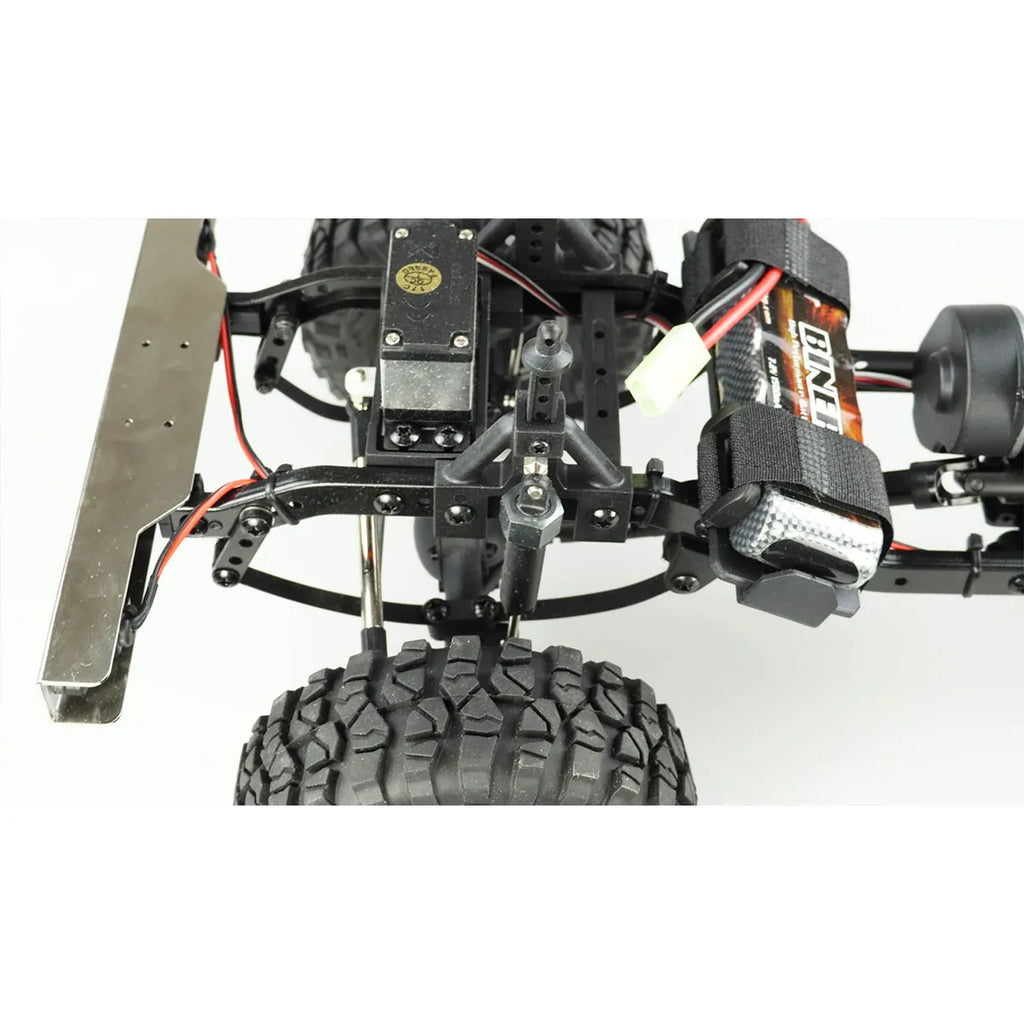 Amewi AMXRock WY1044 Crawler 4x4 22336 im Maßstab 1:10 Crawler RTR – Unteransicht mit Chassis, Motor und Reifen