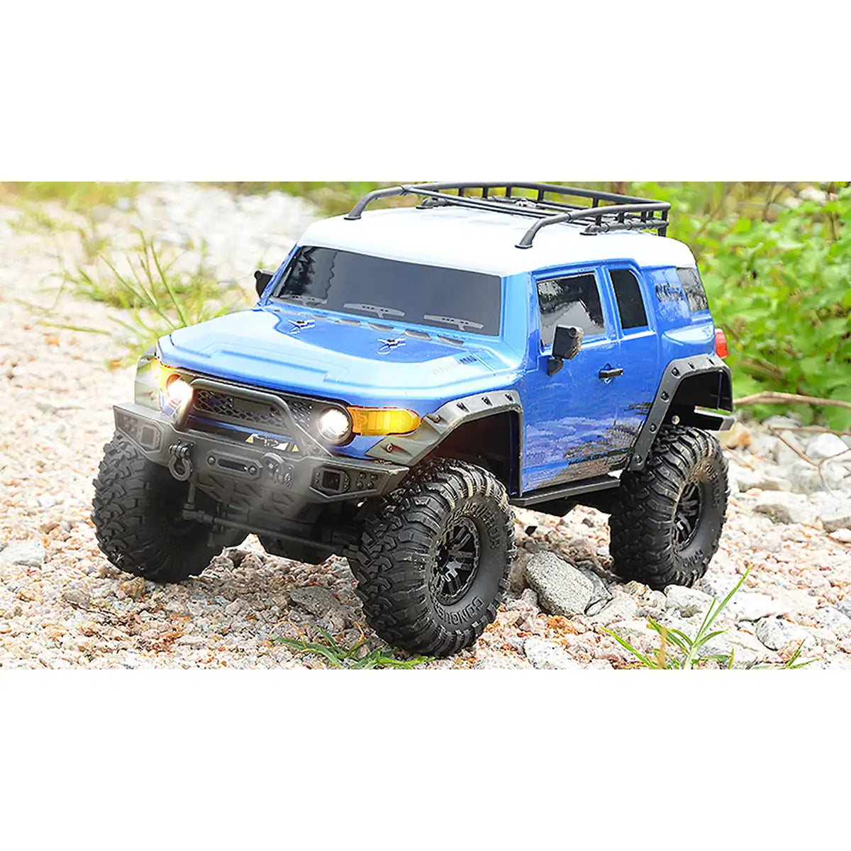 Amewi Dirt Climbing SUV CV Crawler 4WD blau 22591 im Maßstab 1:10 Crawler RTR – Frontansicht