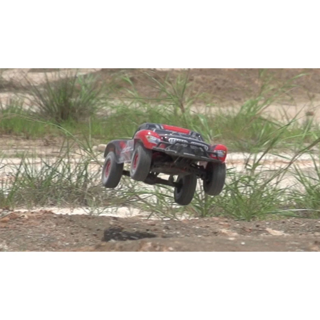 Amewi Fighter-1 Short Course Truck 4WD 22184 im Maßstab 1:12 Offroad RTR – Seitenansicht