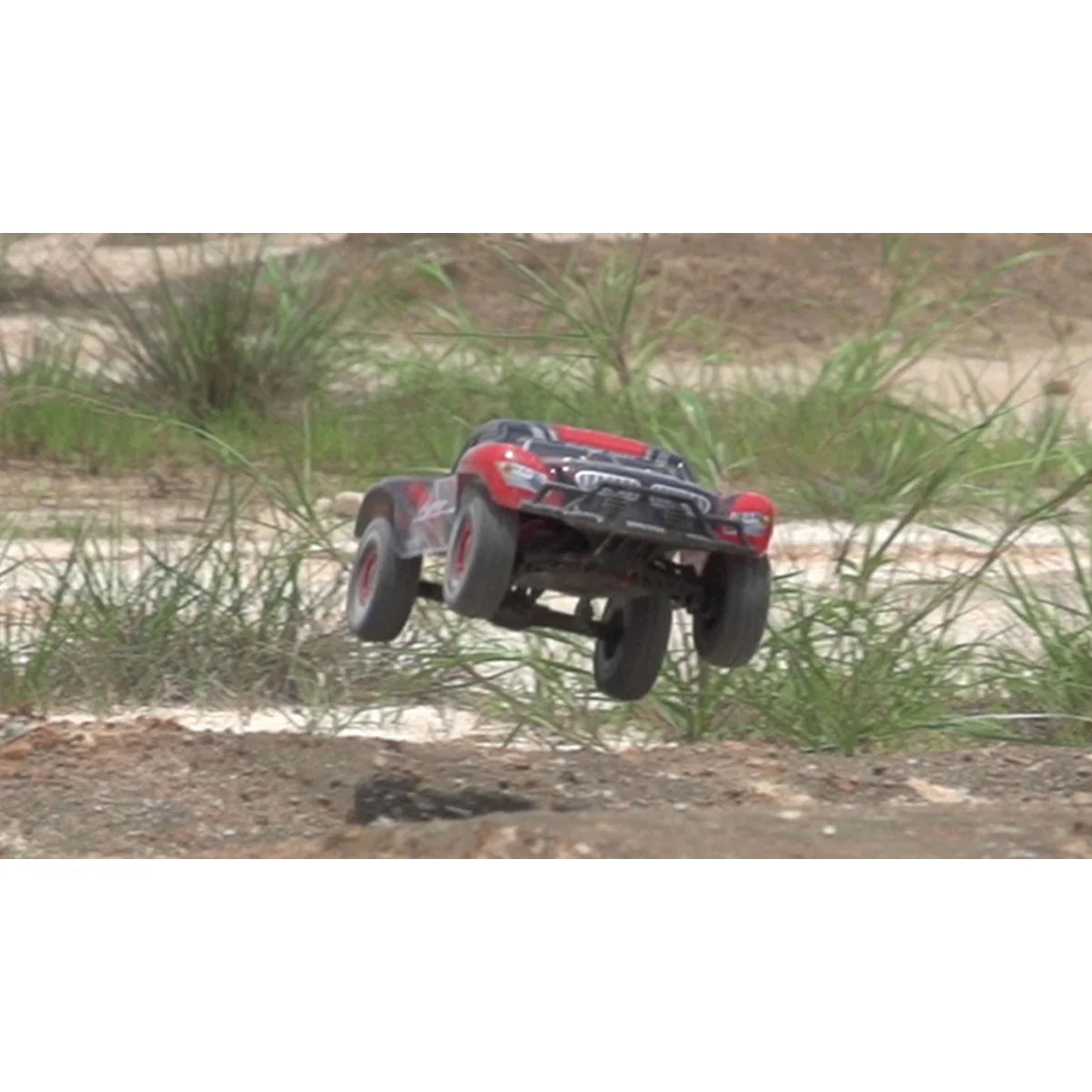 Amewi Fighter-1 Short Course Truck 4WD 22184 im Maßstab 1:12 Offroad RTR – Seitenansicht