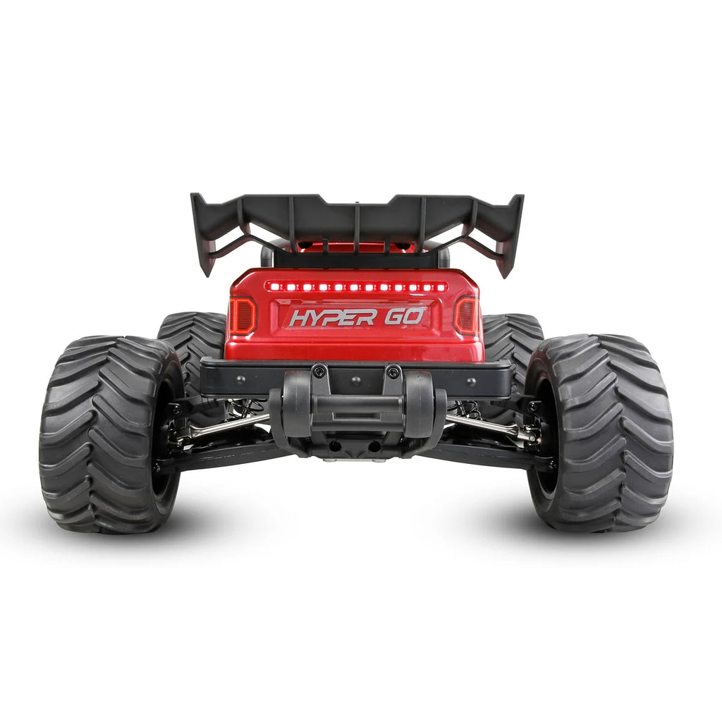 Amewi Hyper Go TX10 Truggy Brushless Rot 22772 im Maßstab 1:10 Offroad RTR – Draufsicht mit großen Reifen und Spoilern