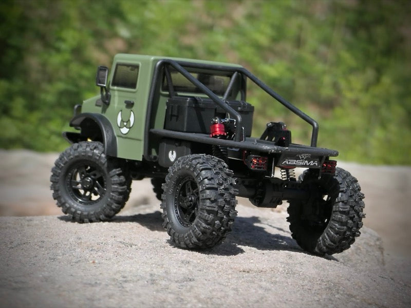 Hobby Plus CR18P V3 T-Hunter Brushless Crawler 1:18 4WD RTR Grün HBP1810418-V3 – Actionbild am Felsen