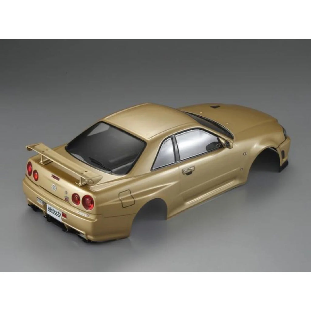Killerbody NISSAN SKYLINE BNR34 Karosserie lackiert Champaign Gold KB48645 im Maßstab 1:10 Touring Car & Onroad – Draufsicht