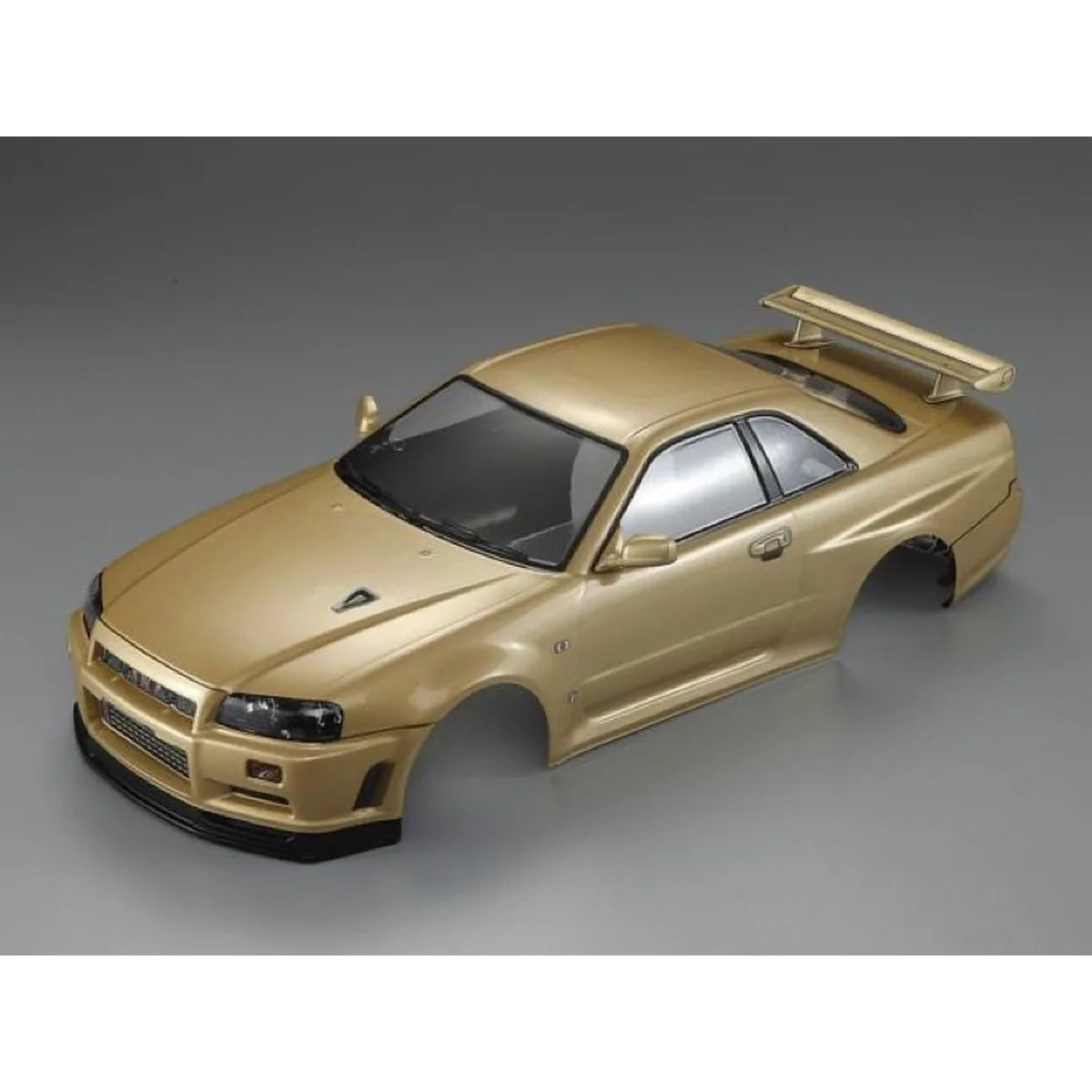 Killerbody NISSAN SKYLINE BNR34 Karosserie lackiert Champaign Gold KB48645 im Maßstab 1:10 Touring Car & Onroad – Draufsicht