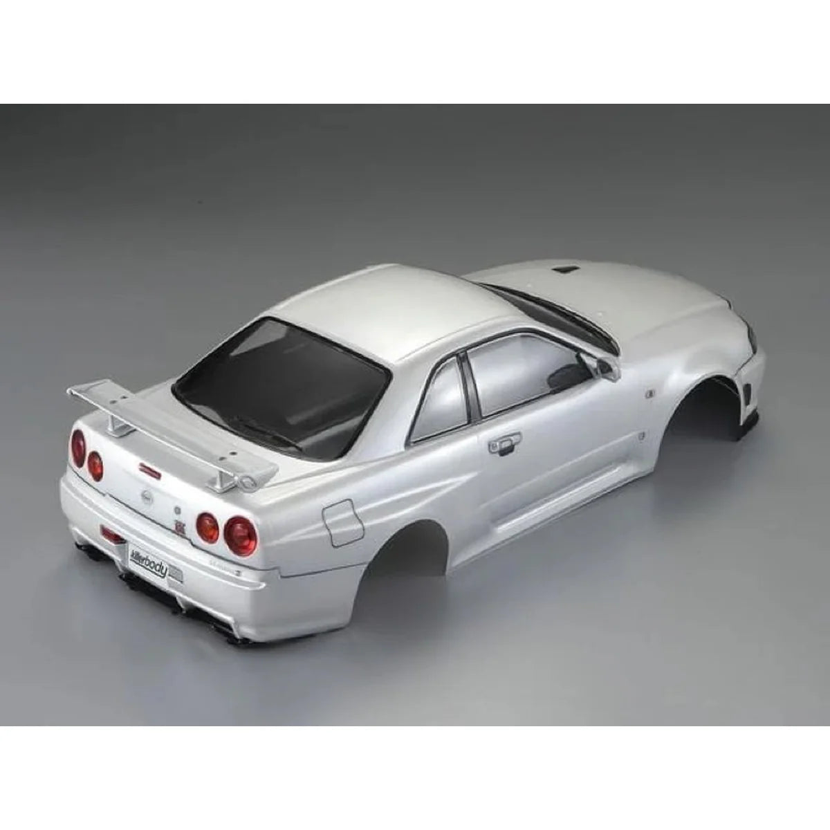 Killerbody Nissan Skyline BNR34 Karosserie lackiert Perlweiß KB48644 im Maßstab 1:10 Touring Car & Onroad – Draufsicht