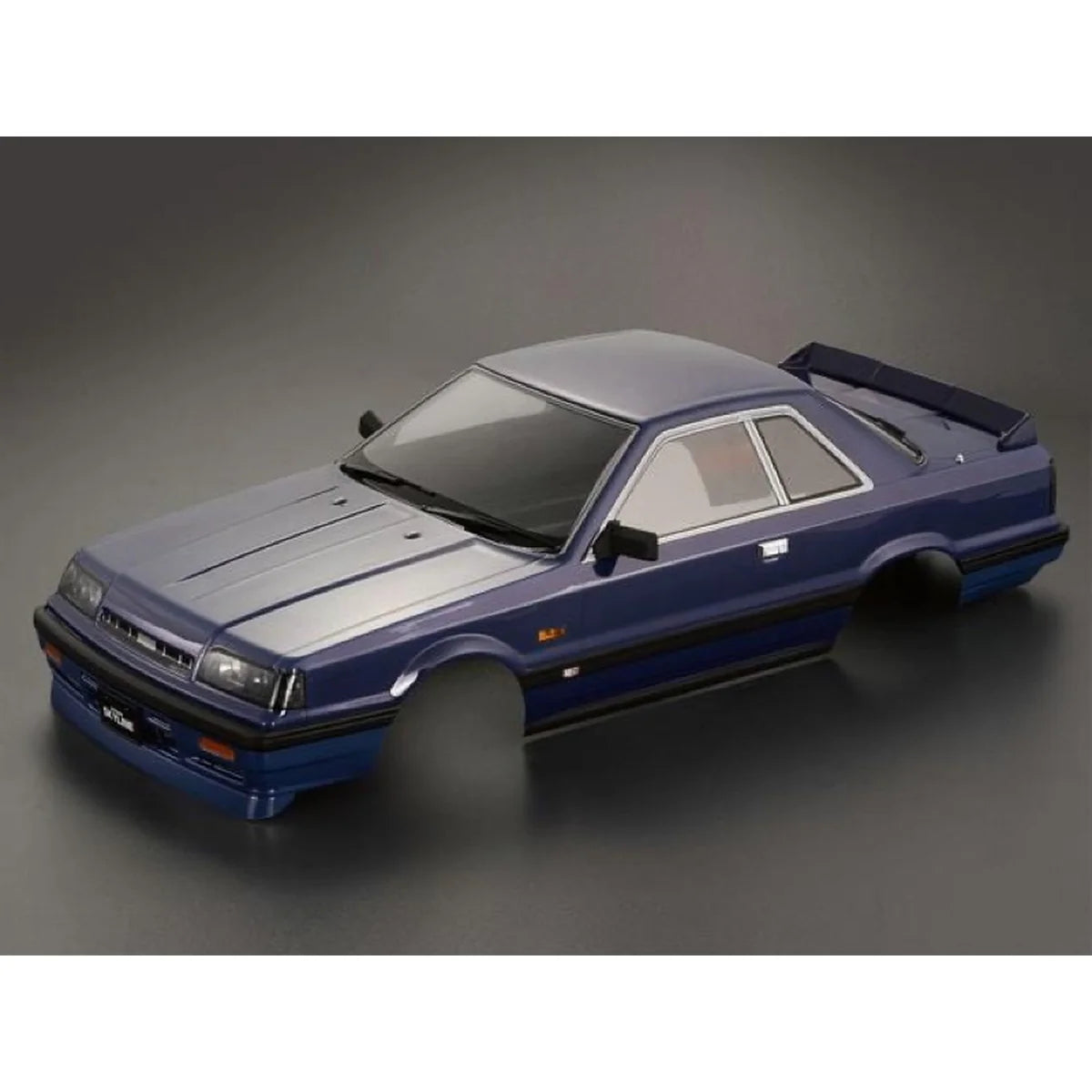 Killerbody NISSAN SKYLINE R31 Karosserie lackiert Blau KB48678 im Maßstab 1:10 Touring Car & Onroad – Seitenansicht