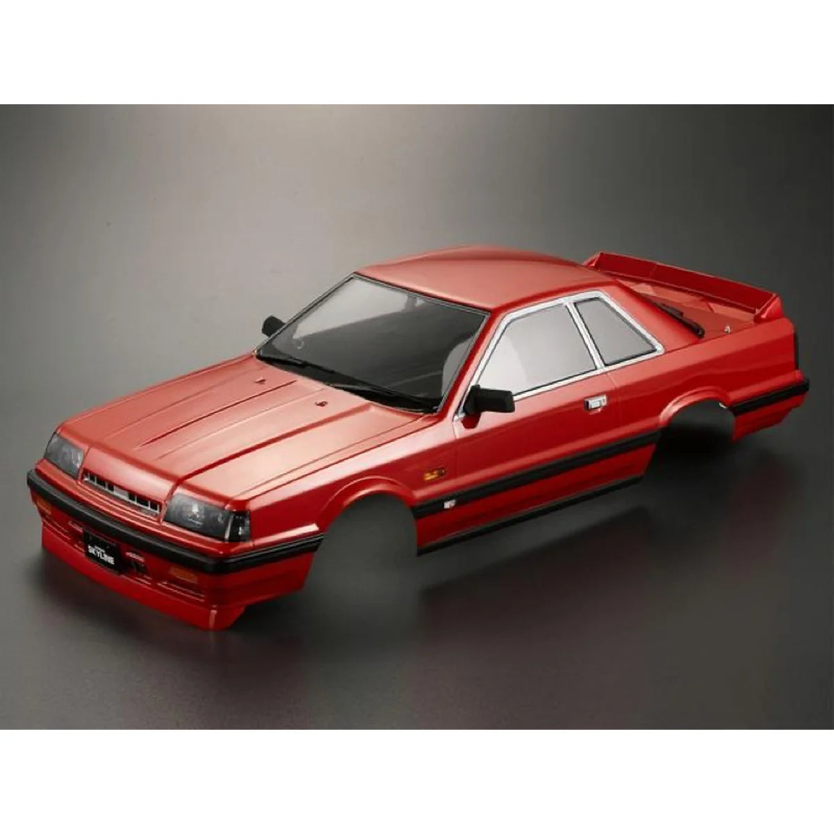 Killerbody NISSAN SKYLINE R31 Karosserie lackiert Rot KB48677 im Maßstab 1:10 Touring Car & Onroad – Seitenansicht