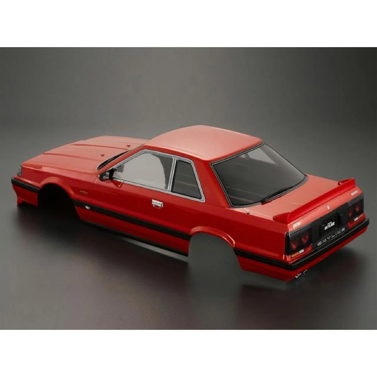Killerbody NISSAN SKYLINE R31 Karosserie lackiert Rot KB48677 im Maßstab 1:10 Touring Car & Onroad – Seitenansicht